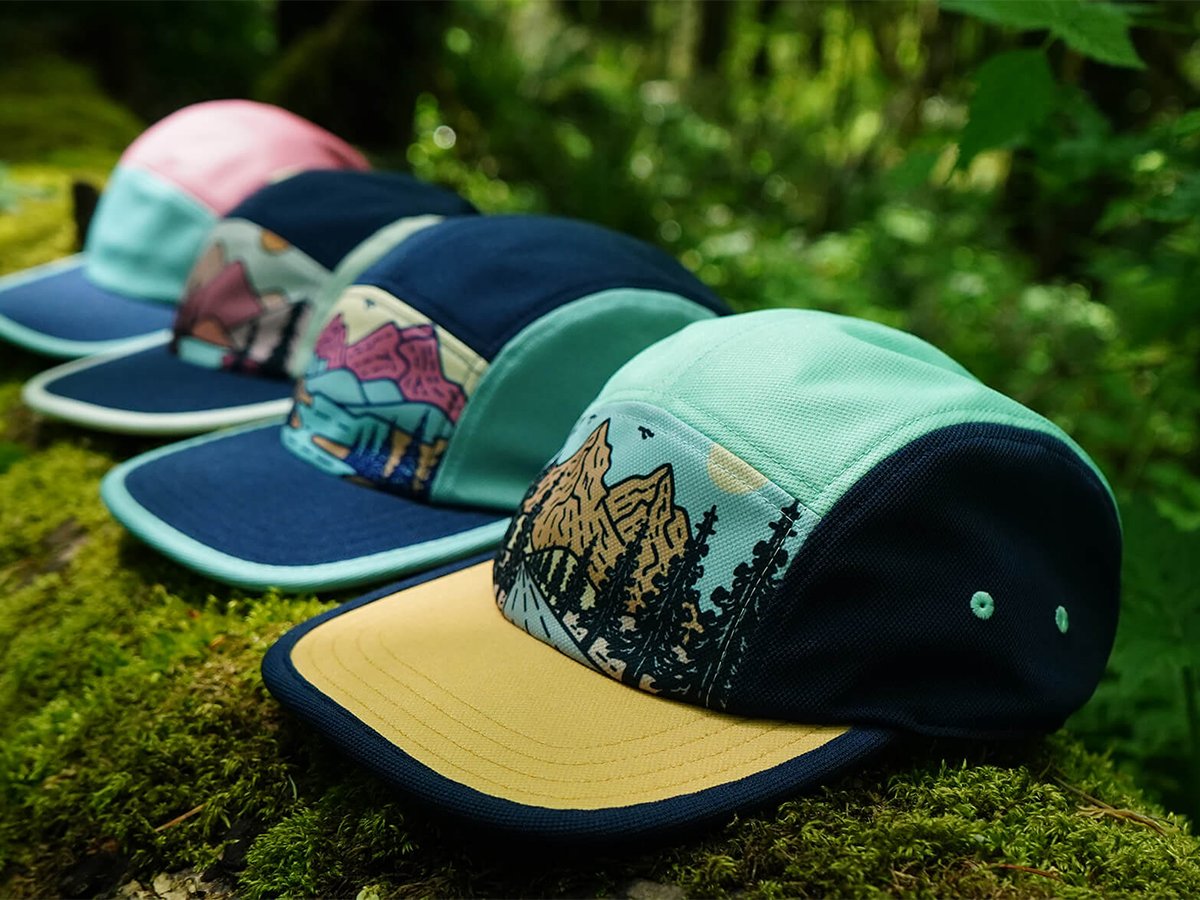 Storied Hats - outdoor performance caps in mossy forest